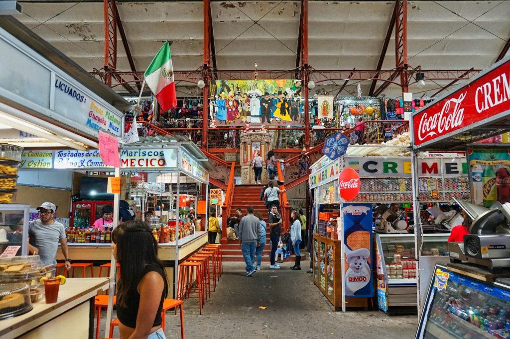 A store filled with lots of items and people