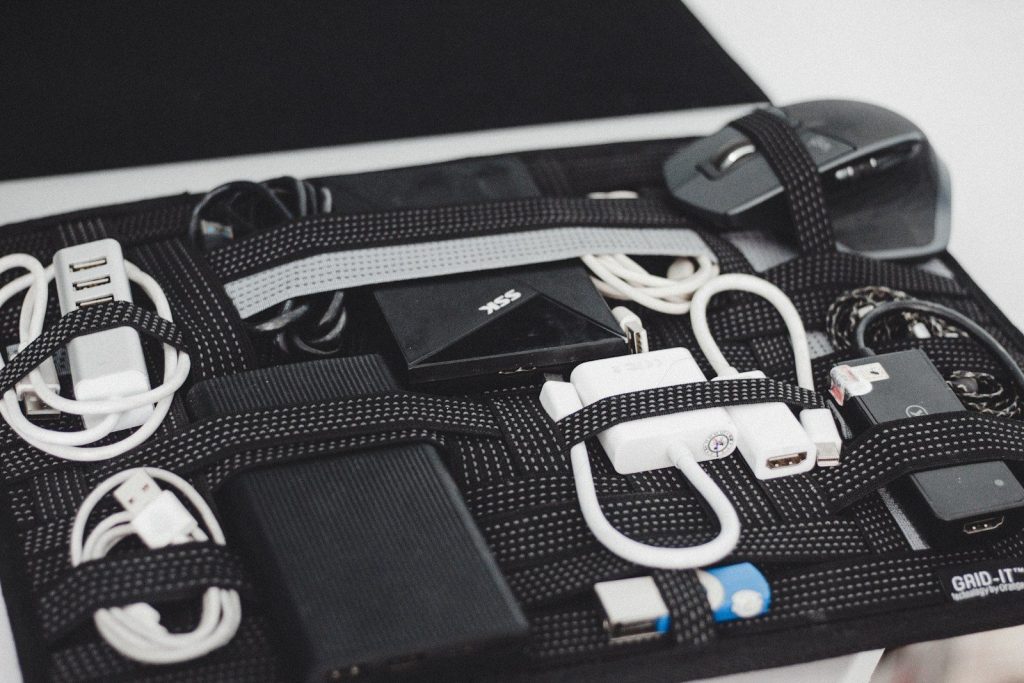 a black case filled with electronics and cords
